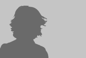 A silhouette of a young adult woman isolated on a white background.